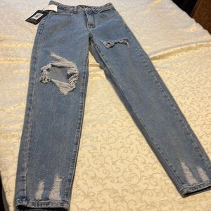 PRETTYLITTLETHING mid blue wash open knee ripped hem mom jeans